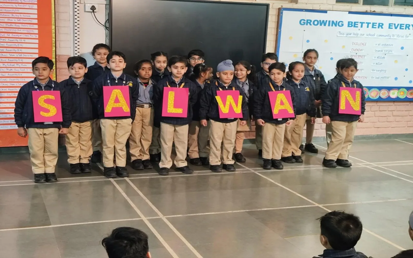 Students presenting the Salwan name during a school heritage programme