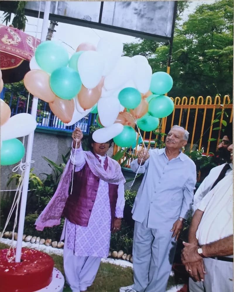 Guests releasing balloons during a Salwan school ceremony