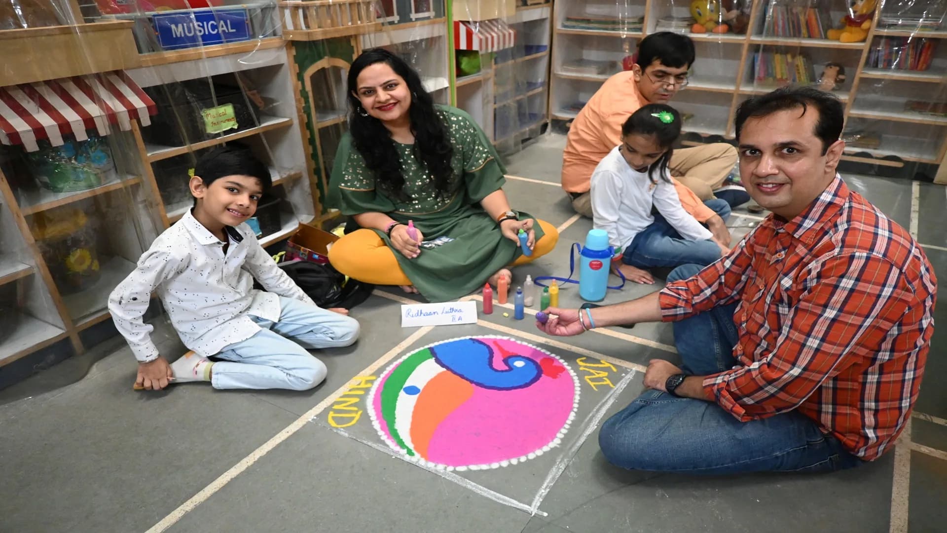 A family participating in a Salwan Junior School community activity