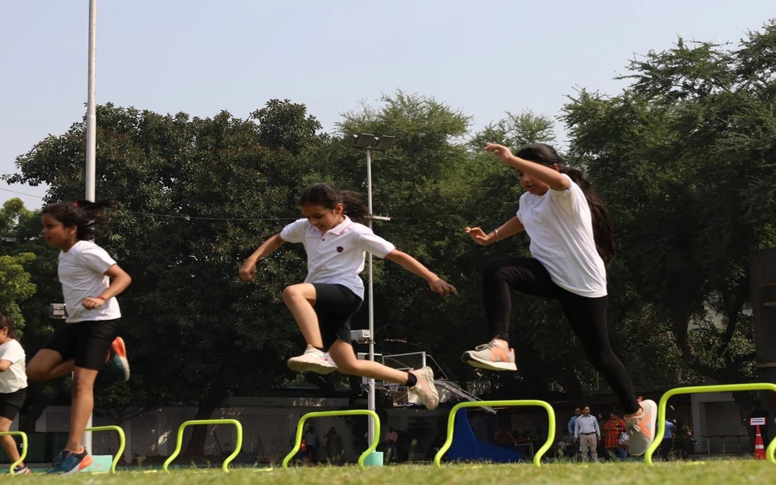 Students taking part in an outdoor obstacle activity at Salwan Junior School