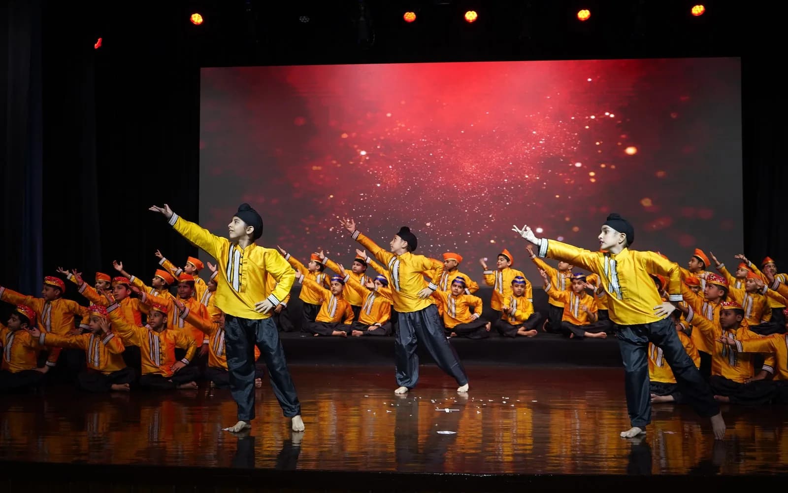 Salwan Junior School students performing together on stage